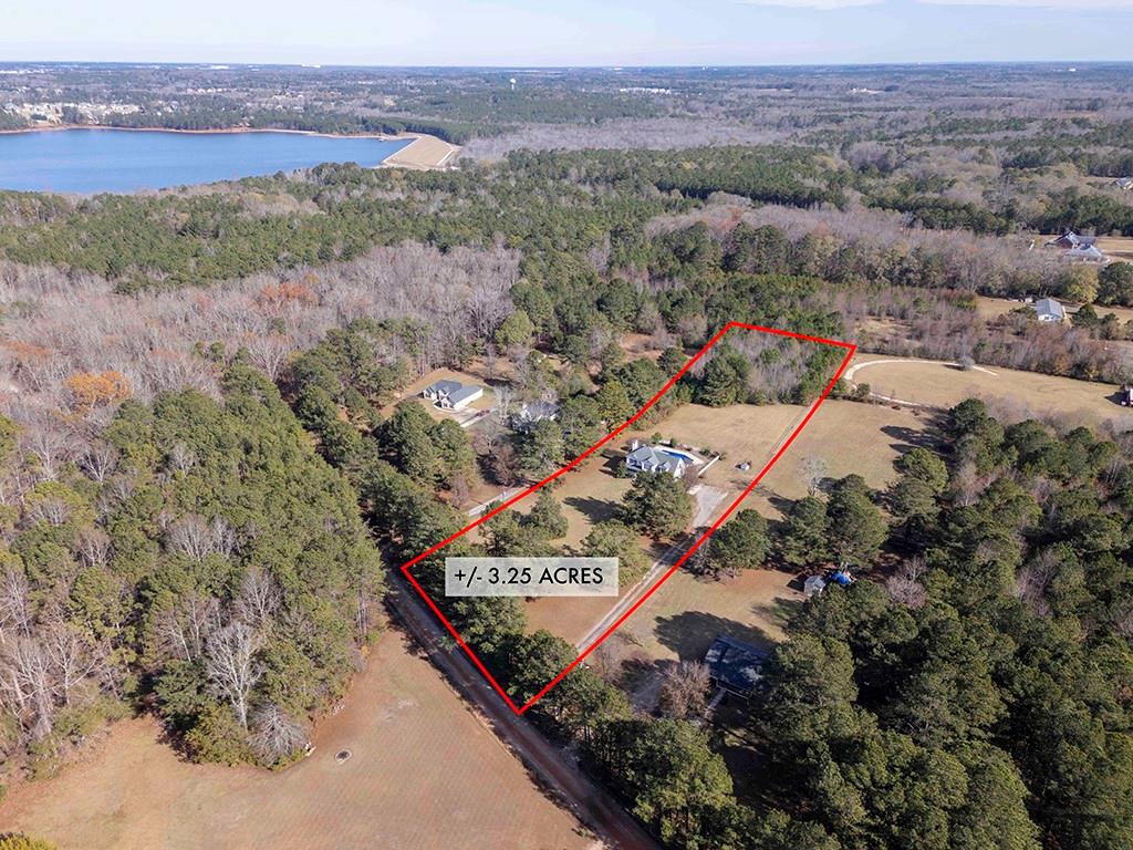 62 Smoak Field Road Griffin, GA 30223 - Photo 6 of 50 an aerial view of a house with a yard