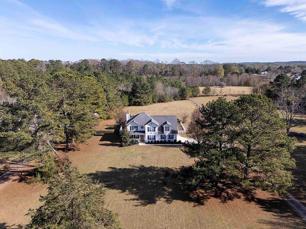 62 Smoak Field Road Griffin, GA 30223 - Photo 7 of 50 a view of a houses with a yard