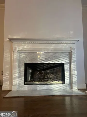 a stove top oven sitting inside of a kitchen
