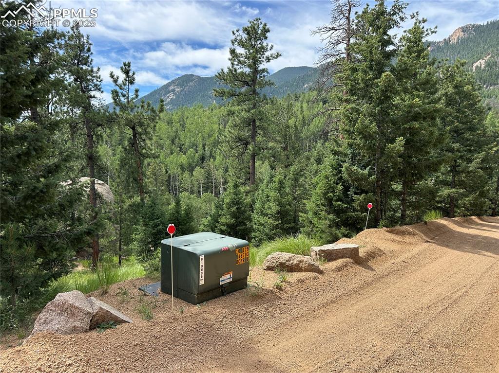 116 Happy Valley Road Manitou Springs, CO 80829 - Photo 14 of 25 a lawn chairs sitting in a yard