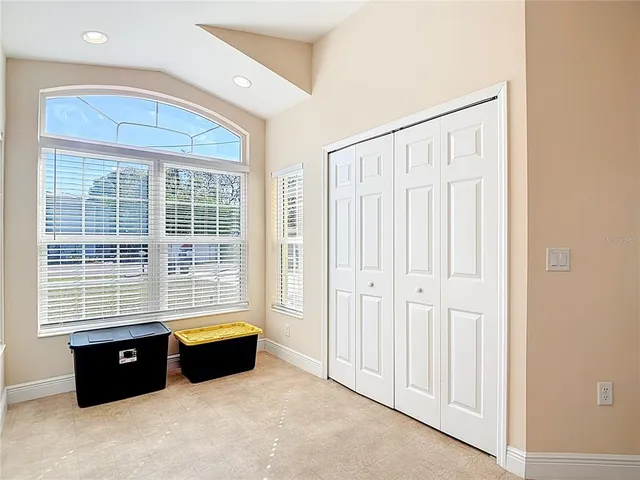 a bathroom with a sink vanity granite and a mirror