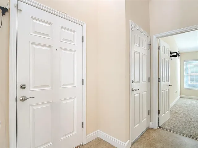 an aerial view of a house with a swimming pool