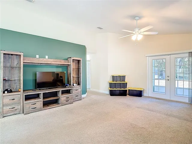 a kitchen with stainless steel appliances a stove a microwave and a refrigerator