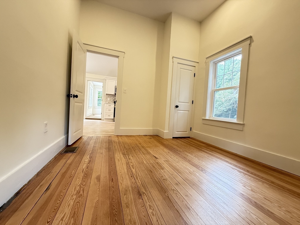 1469 Santuit-Newtown Road Barnstable, MA 02635 - Photo 14 of 18 a view of a room with wooden floor and window