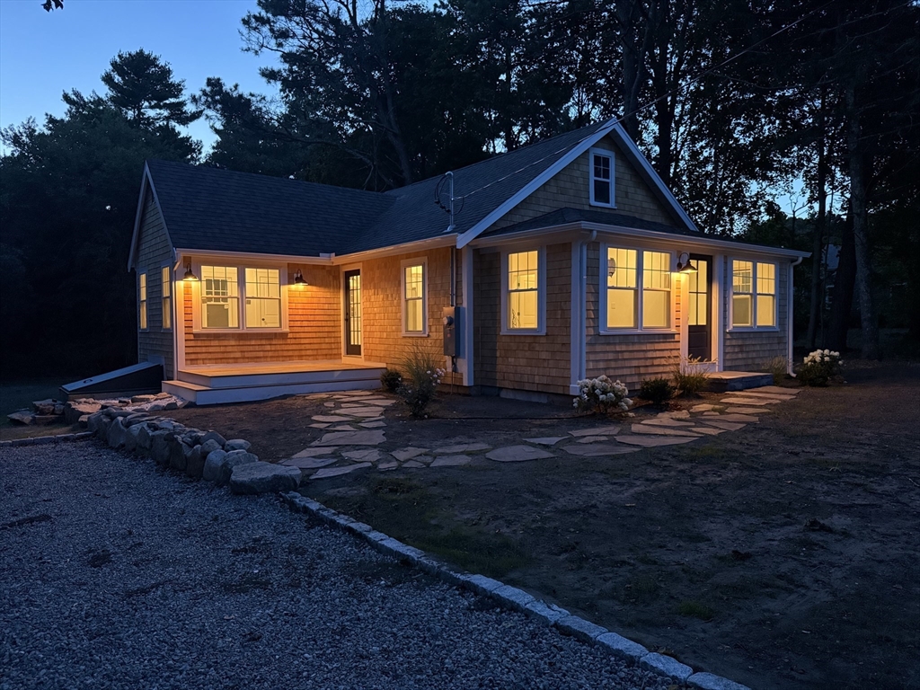 1469 Santuit-Newtown Road Barnstable, MA 02635 - Photo 18 of 18 a front view of a house with a yard
