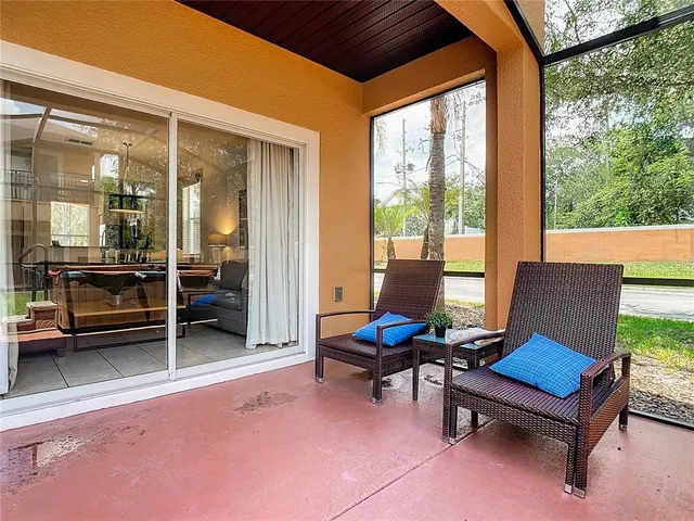 a view of a terrace with furniture