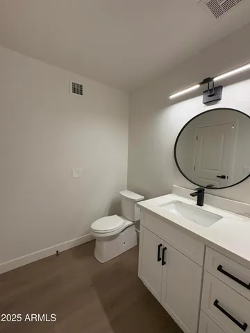 a view of staircase with rug door