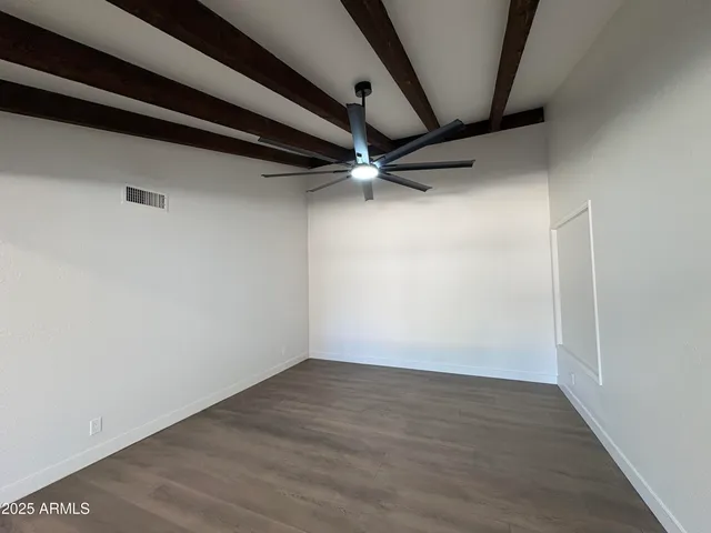 a view of an empty walk in closet