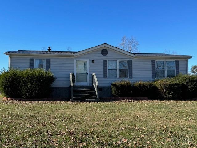 4159 Pin Oak Road Prospect, VA 23960 - Photo 2 of 25 a front view of a house with a garden