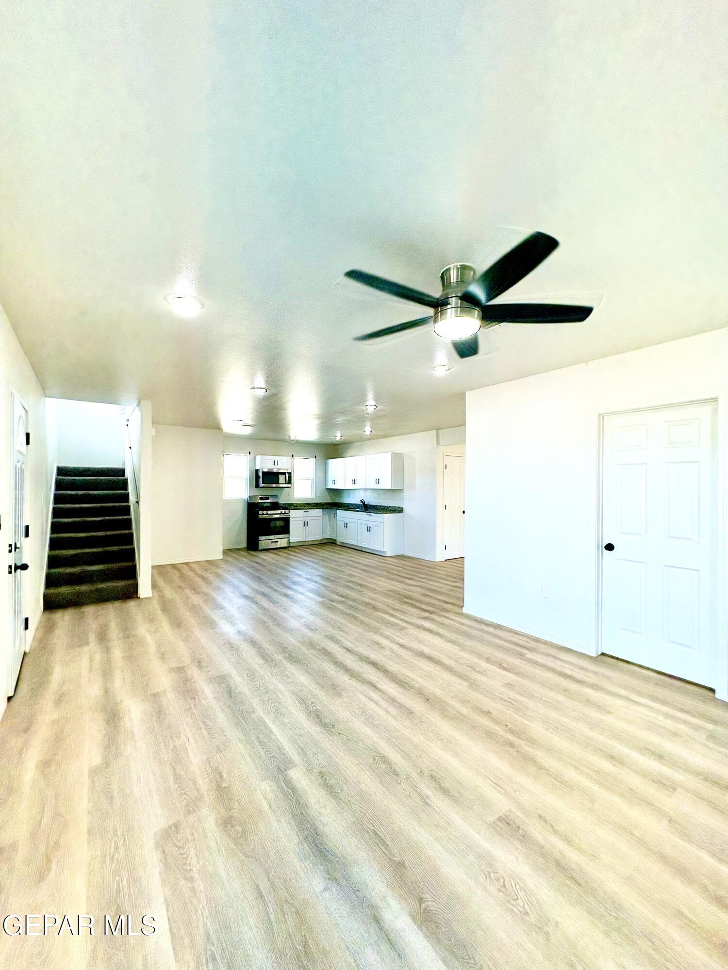 11420 Doris Road Socorro, TX 79927 - Photo 13 of 27 a view of kitchen and empty room