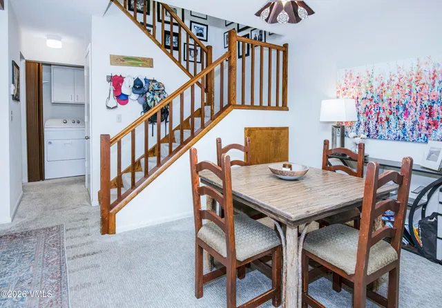 a view of an dining room and wooden floor