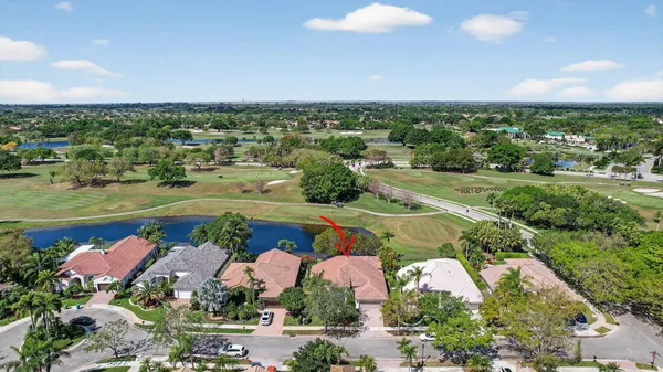 an aerial view of city and lake