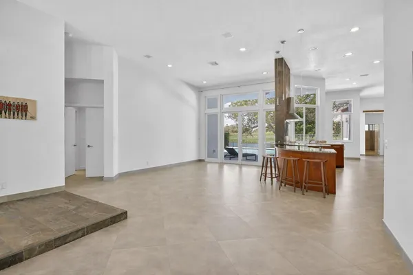 a view of workspace with hardwood floor and a window