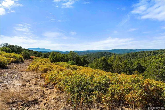 a view of a lake with a mountain in the background
