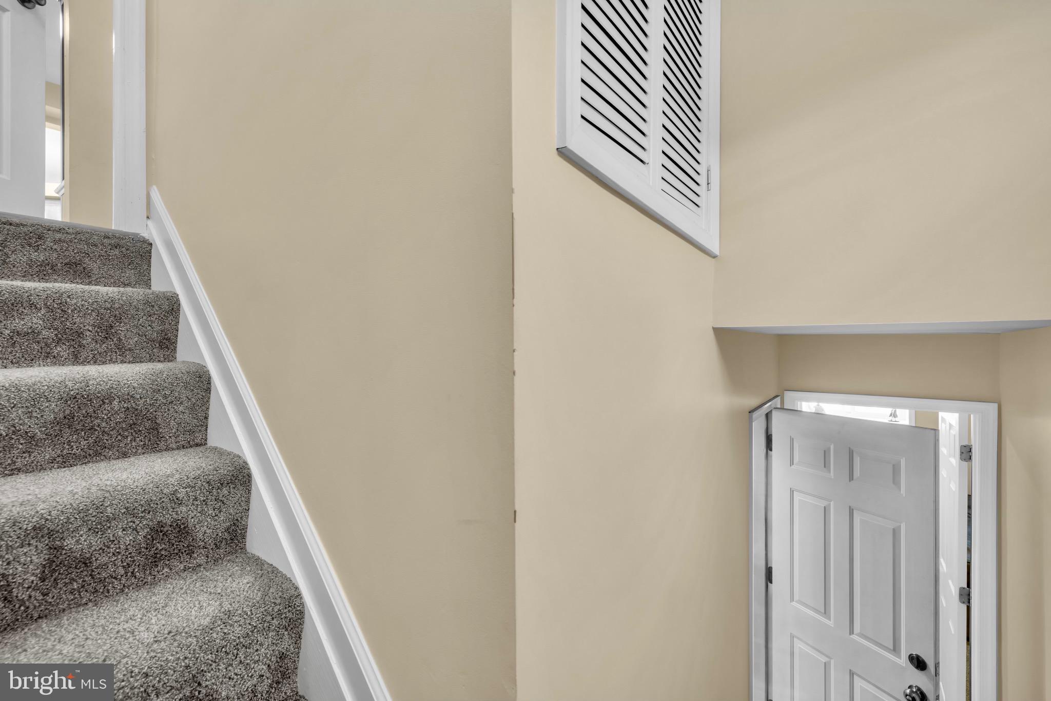 401 2nd Avenue Baltimore, MD 21227 - Photo 42 of 73 Inviting staircase leading to new possibilities.