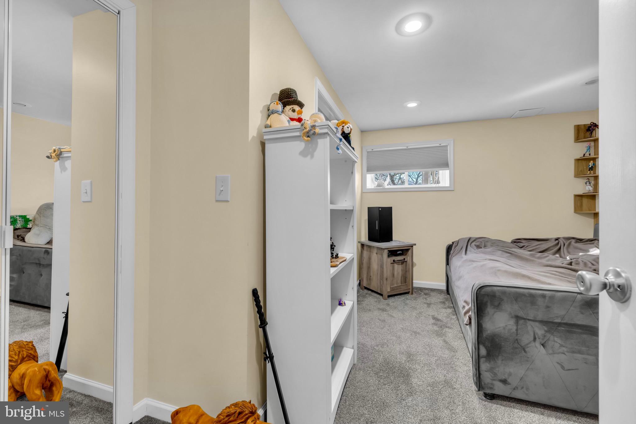 401 2nd Avenue Baltimore, MD 21227 - Photo 44 of 73 Cozy bedroom with inviting neutral tones.