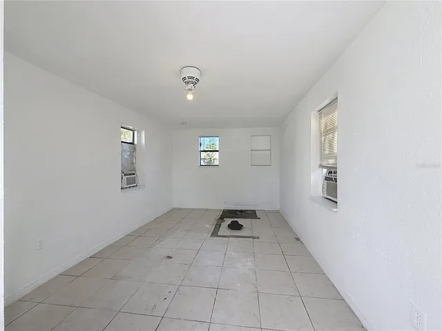 an empty room with windows