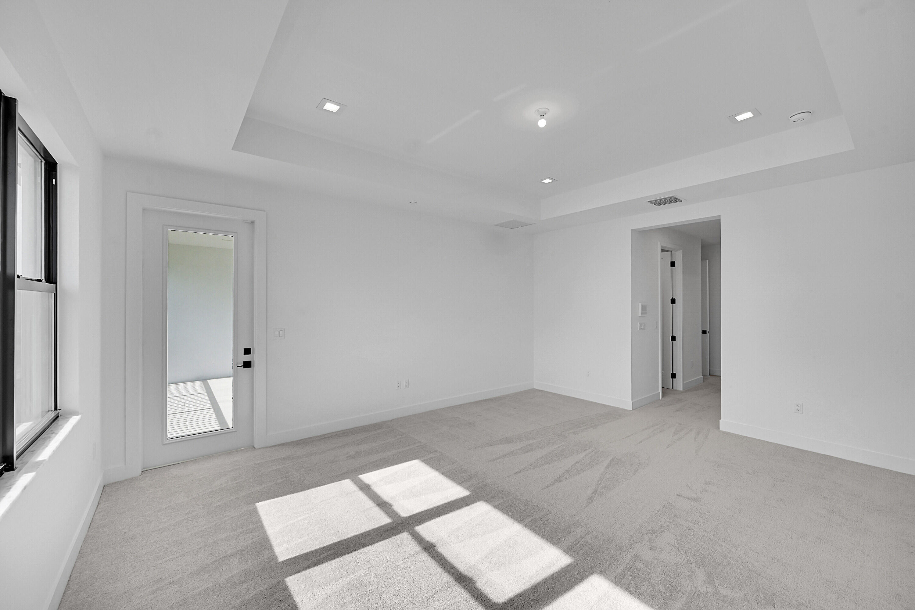 9979 Migration Point Palm Beach Gardens, FL 33412 - Photo 40 of 81 a view of an empty room with a window