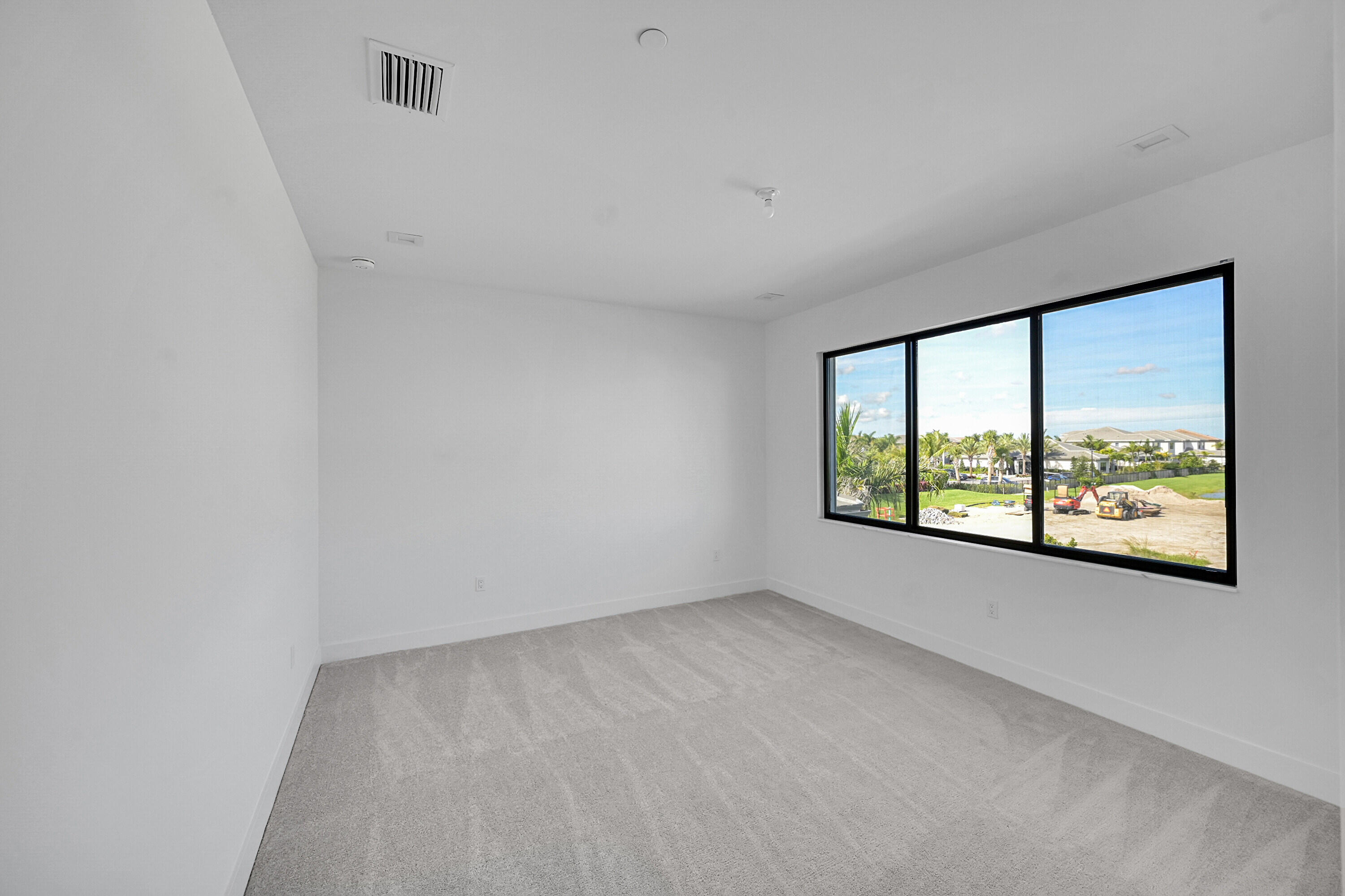 9979 Migration Point Palm Beach Gardens, FL 33412 - Photo 57 of 81 an empty room with a window