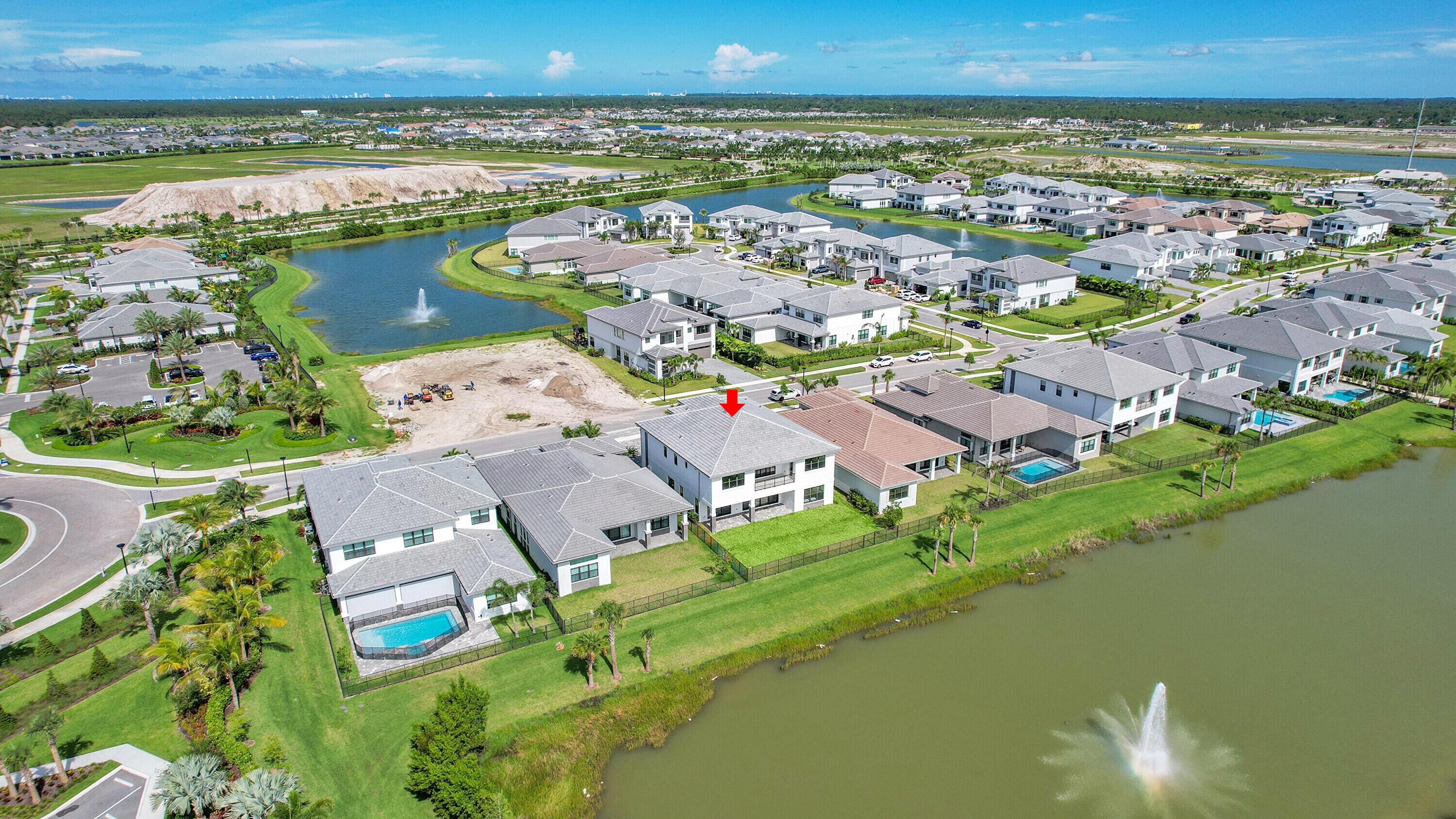9979 Migration Point Palm Beach Gardens, FL 33412 - Photo 72 of 81 an aerial view of residential houses with outdoor space and lake view