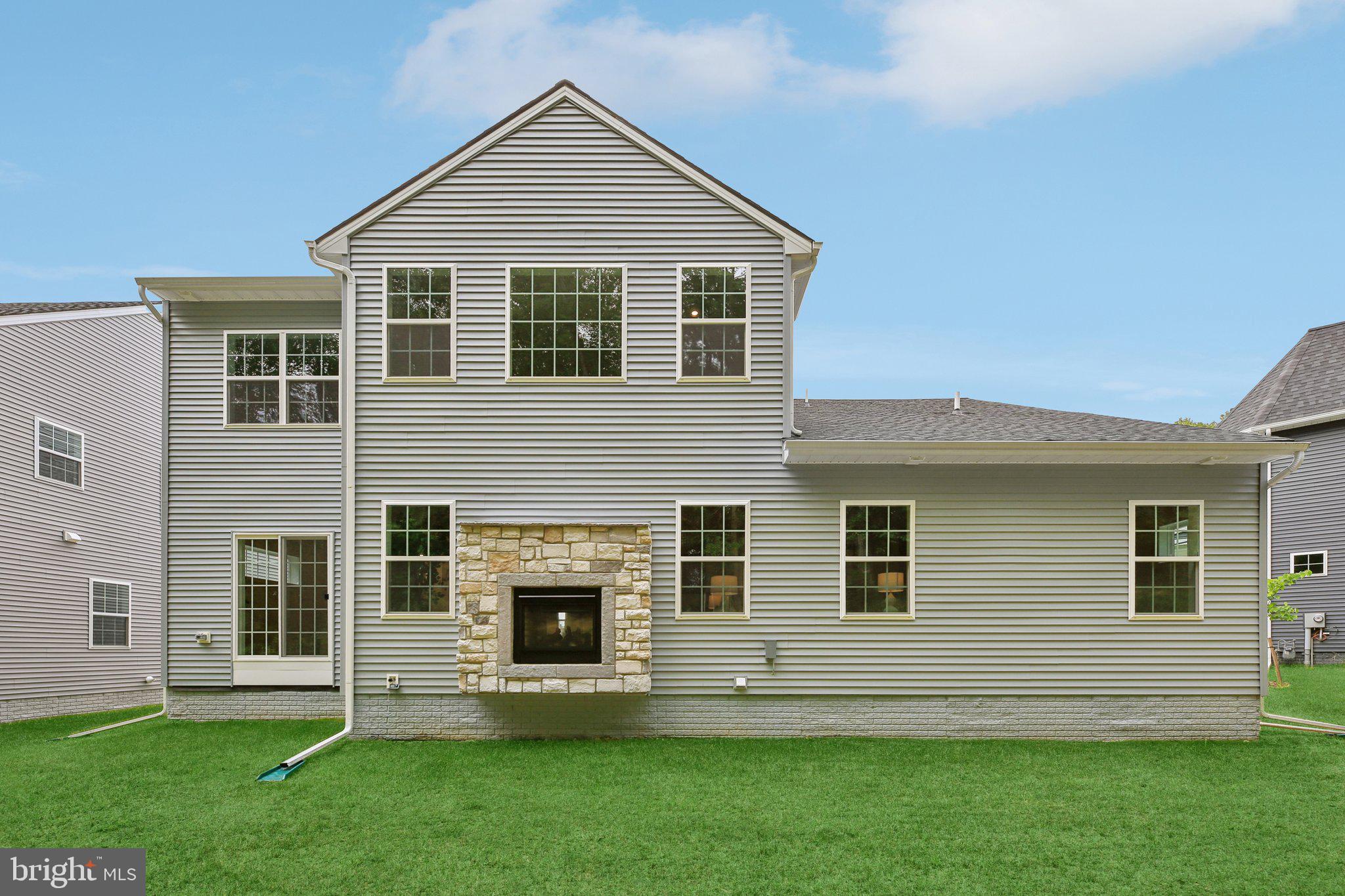 1823 Colt Lane Frederick, MD 21702 - Photo 57 of 66 a front view of a house with a yard