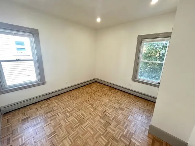 a view of an empty room and window