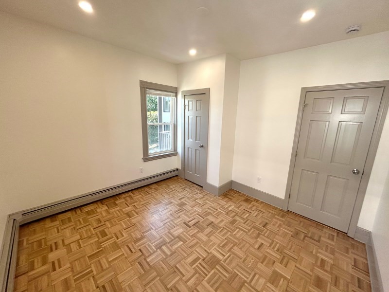 116 Prospect Street, Unit 1 Somerville, MA 02143 - Photo 17 of 21 a view of an empty room