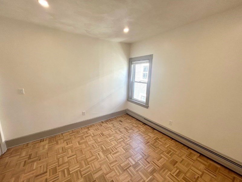 116 Prospect Street, Unit 1 Somerville, MA 02143 - Photo 19 of 21 a view of empty room