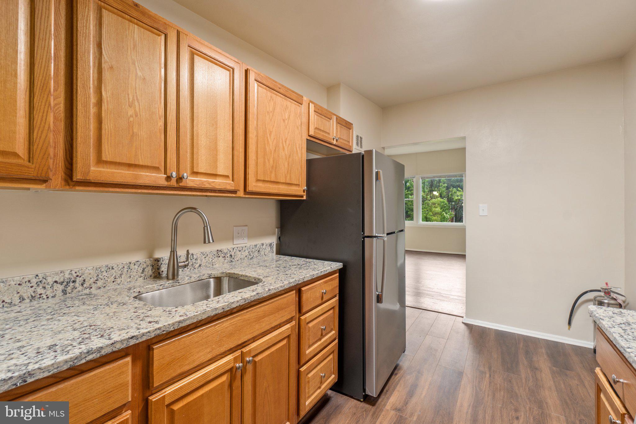 1029 Quebec Terrace, Unit 8 Silver Spring, MD 20903 - Photo 7 of 21 Modern kitchen with sleek finishes.