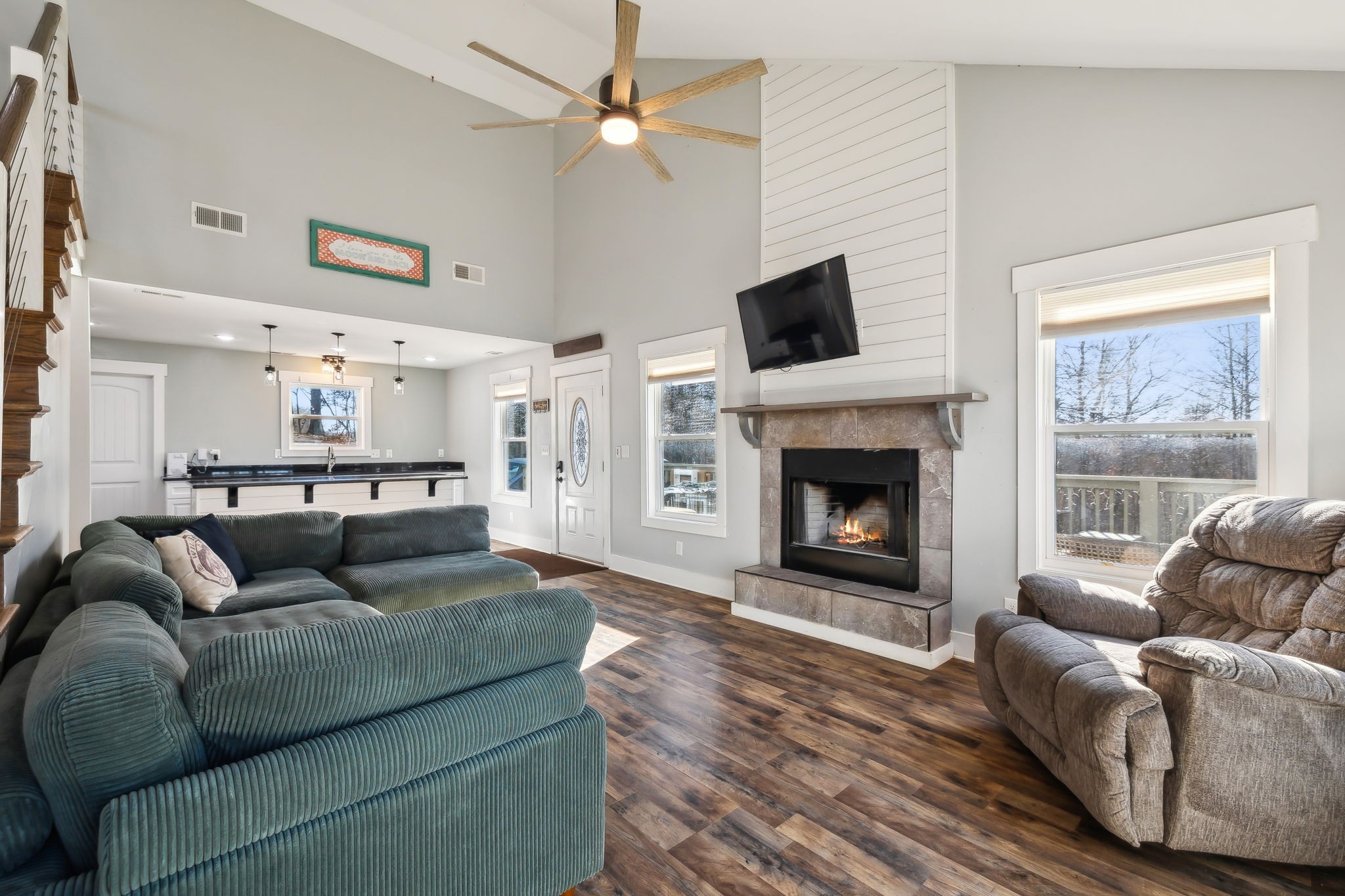93 Halliburton Road Vanleer, TN 37181 - Photo 17 of 75 a living room with furniture and a fireplace
