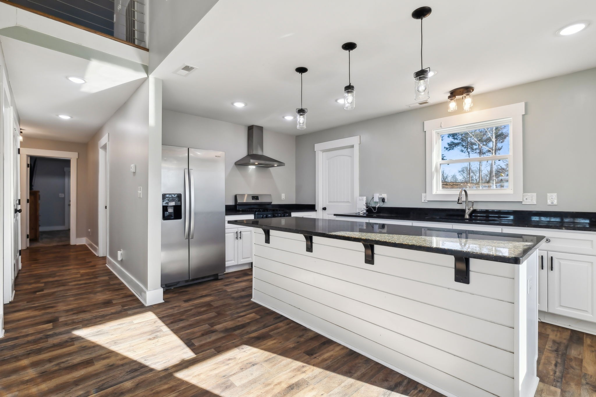 93 Halliburton Road Vanleer, TN 37181 - Photo 18 of 75 a room with stainless steel appliances kitchen island sink refrigerator and cabinets