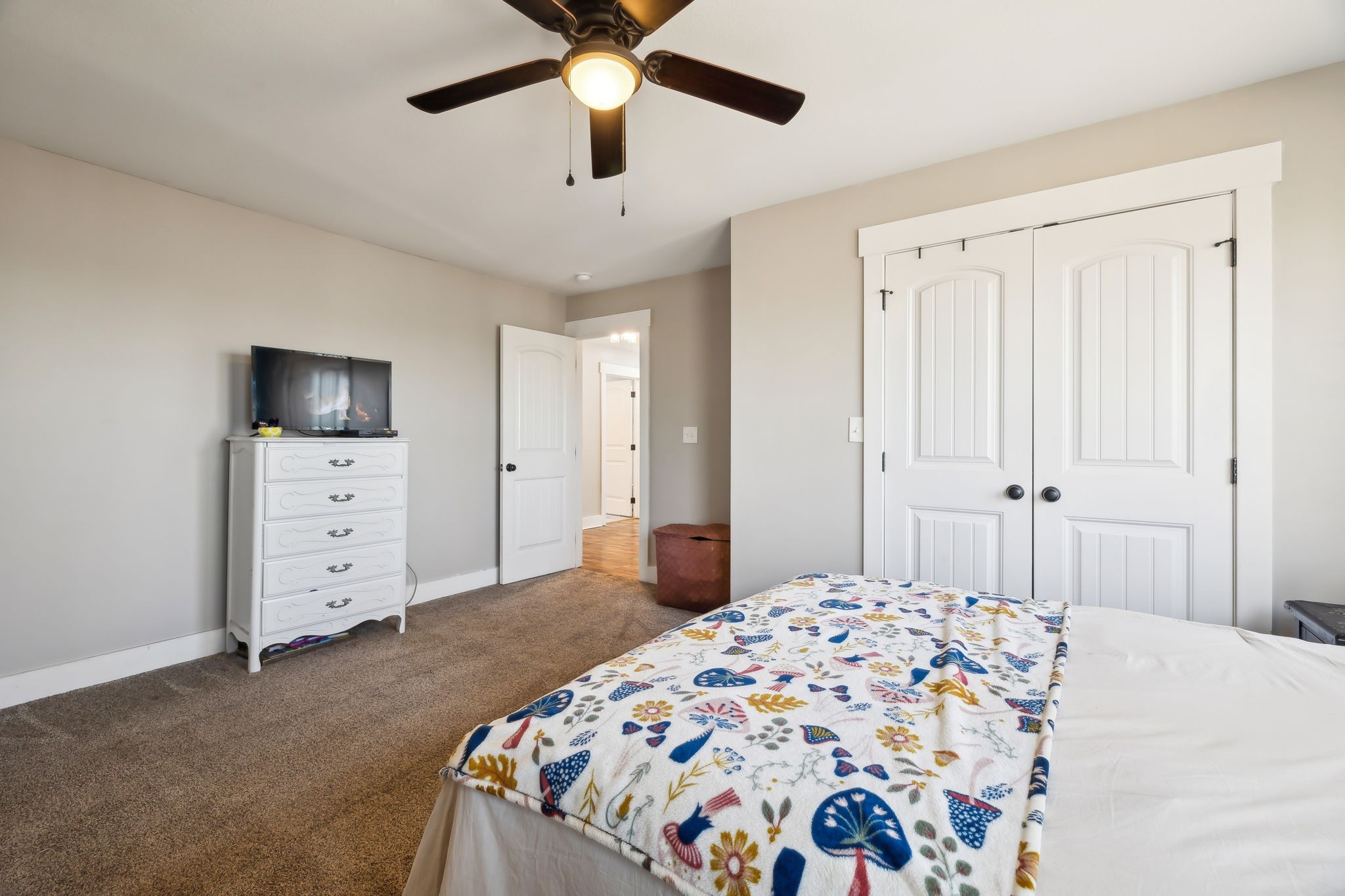 93 Halliburton Road Vanleer, TN 37181 - Photo 28 of 75 a bedroom with a large bed and a tv