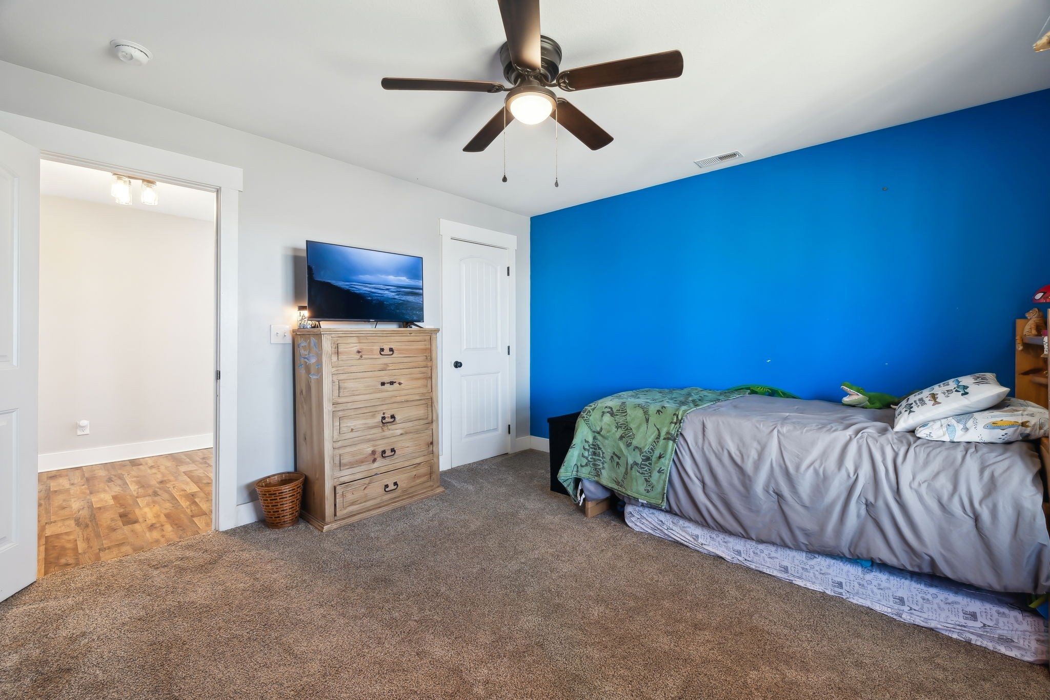 93 Halliburton Road Vanleer, TN 37181 - Photo 31 of 75 a bed room with a bed and a ceiling fan