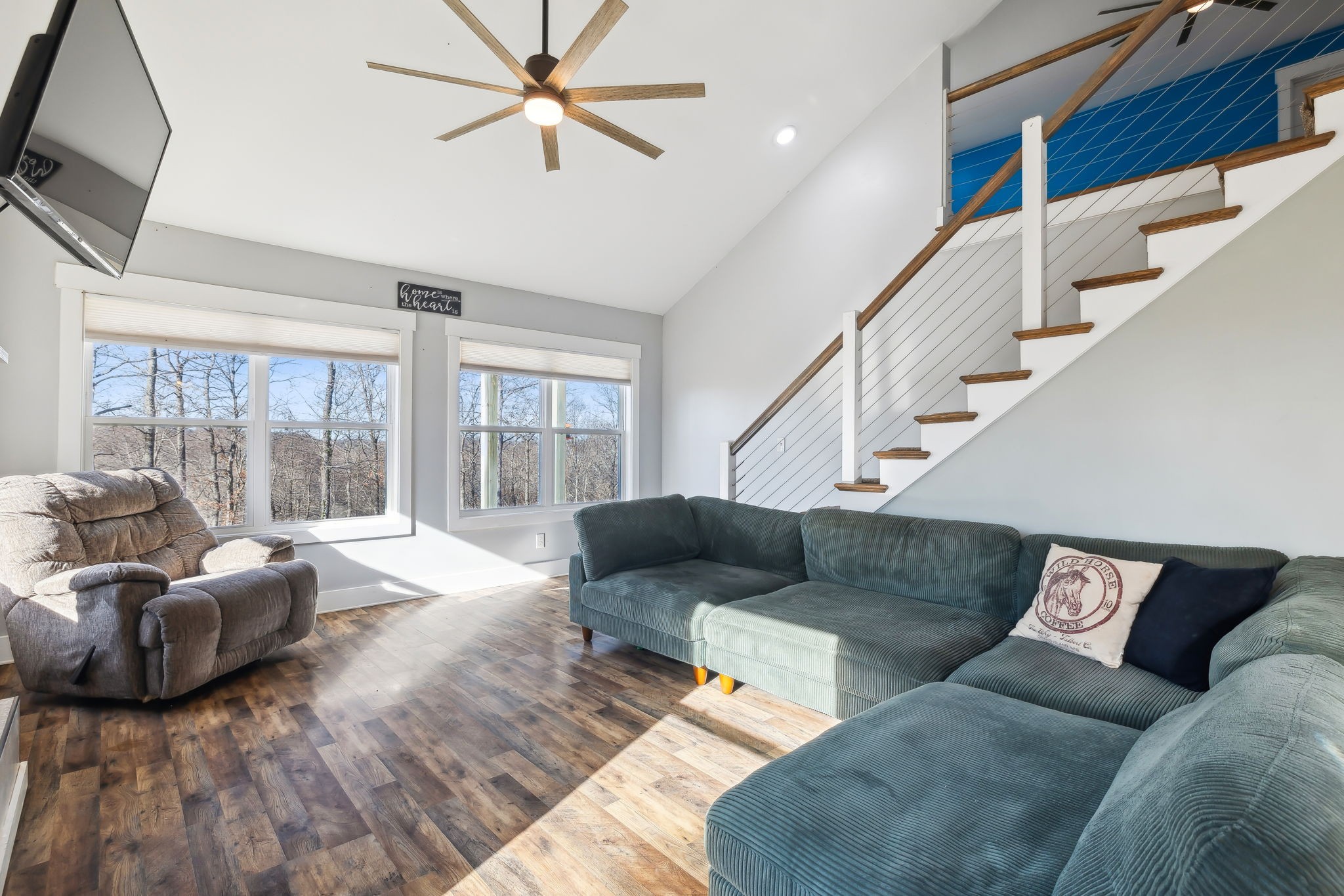 93 Halliburton Road Vanleer, TN 37181 - Photo 32 of 75 a living room with furniture and a flat screen tv