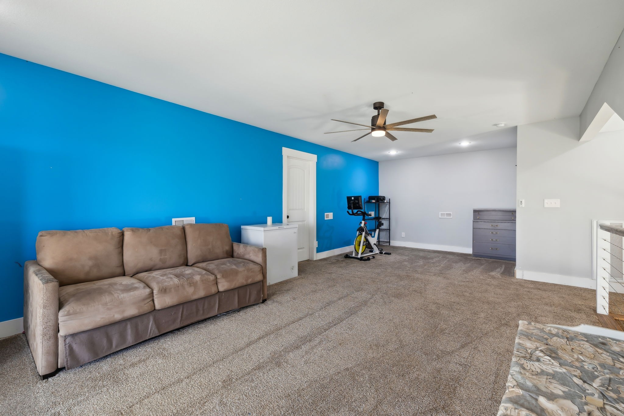 93 Halliburton Road Vanleer, TN 37181 - Photo 41 of 75 a living room with furniture and a ceiling fan