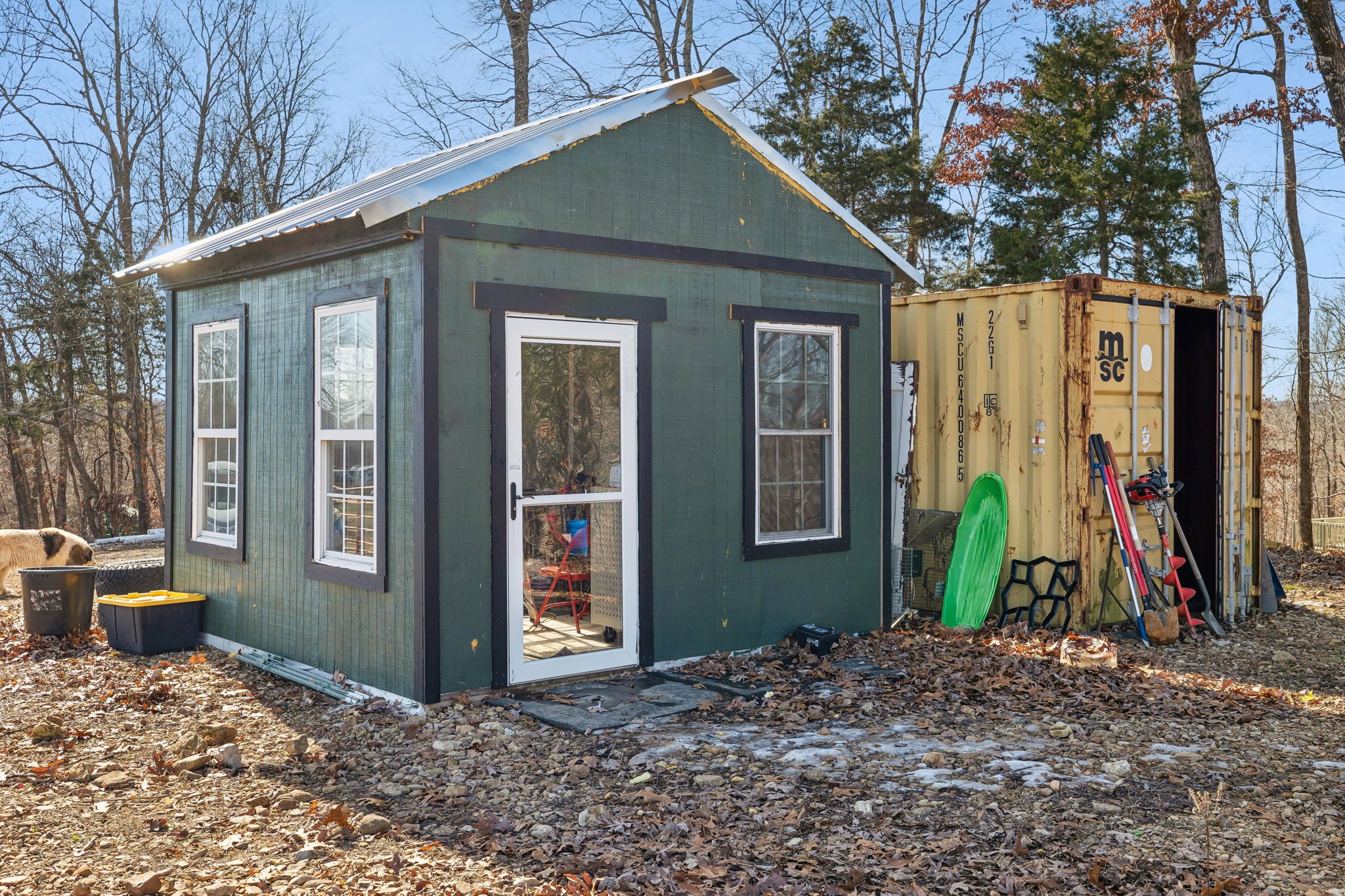 93 Halliburton Road Vanleer, TN 37181 - Photo 46 of 75 a view of a house with a backyard