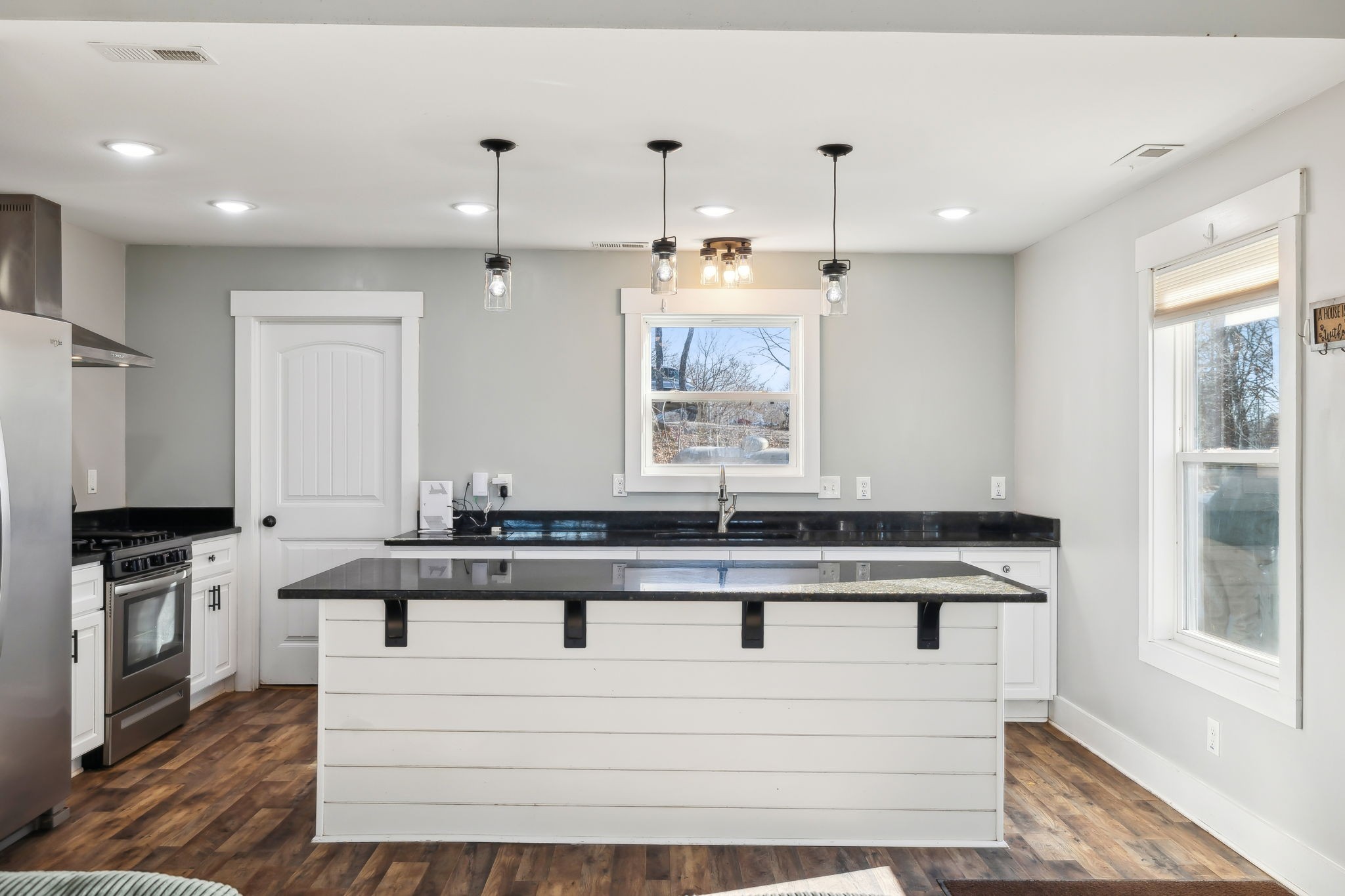 93 Halliburton Road Vanleer, TN 37181 - Photo 6 of 75 a view of kitchen with stainless steel appliances granite countertop a stove a sink and a refrigerator