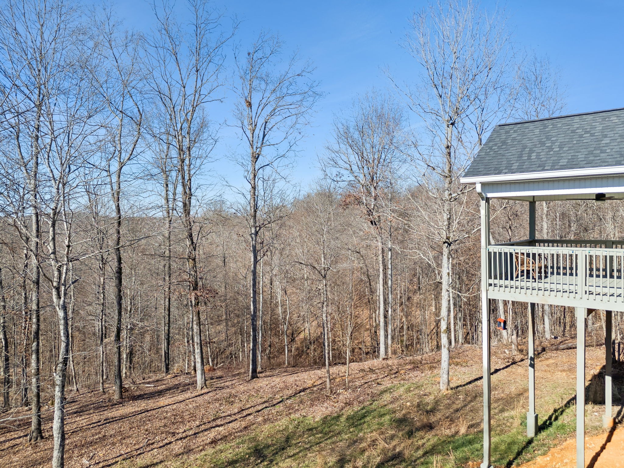 93 Halliburton Road Vanleer, TN 37181 - Photo 61 of 75 a view of a brick house next to a yard