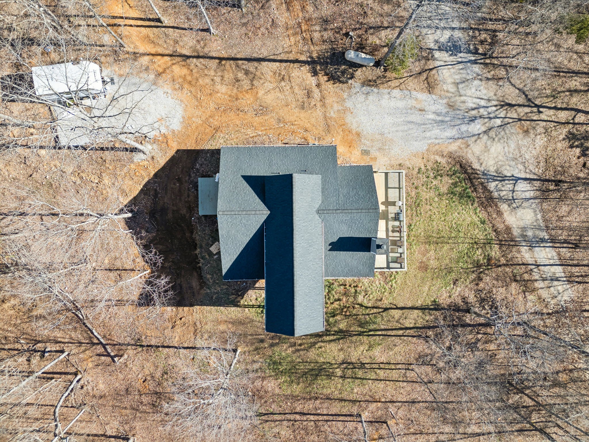 93 Halliburton Road Vanleer, TN 37181 - Photo 63 of 75 a view of a house with a snow in the background