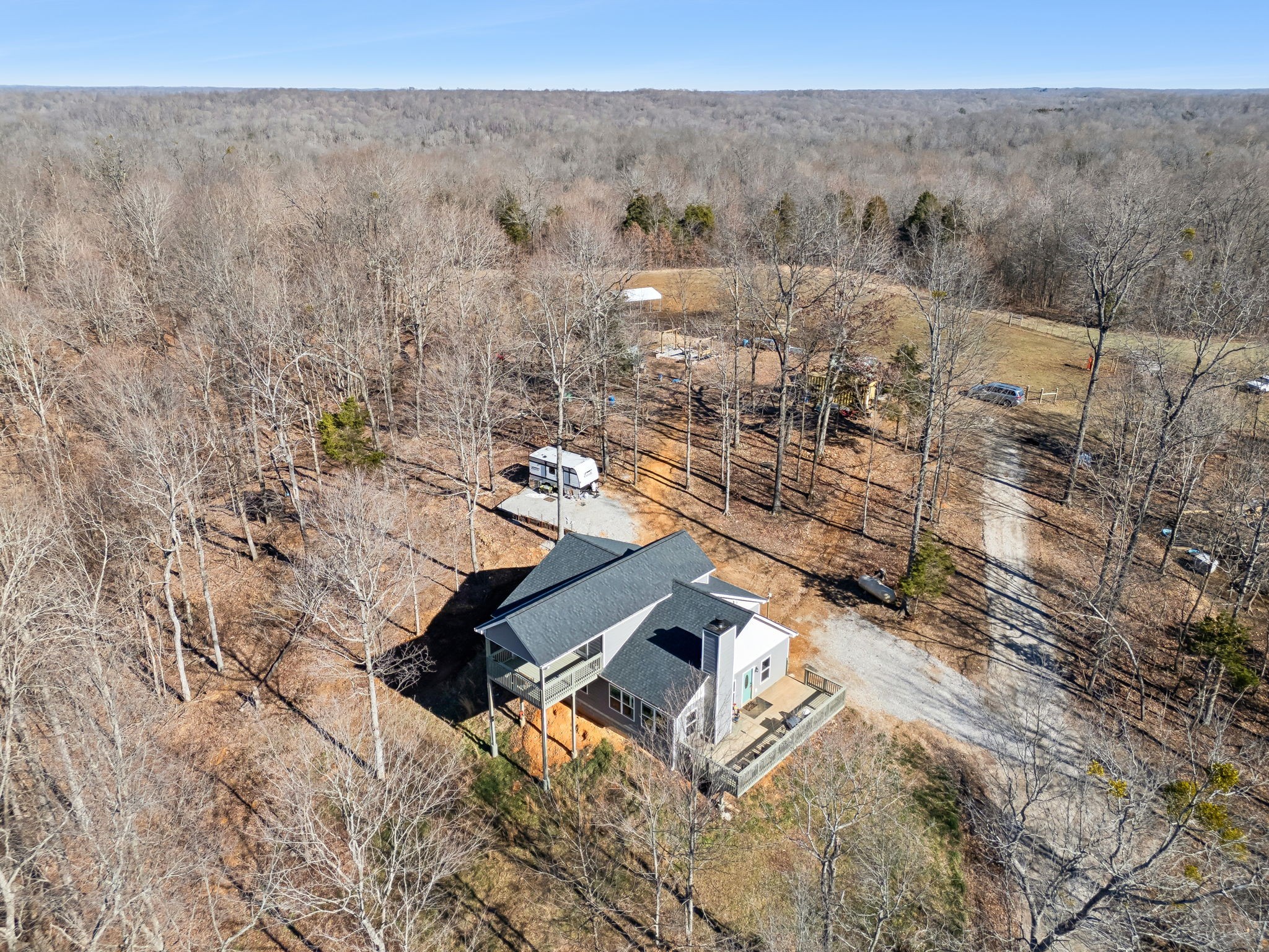 93 Halliburton Road Vanleer, TN 37181 - Photo 64 of 75 a view of a house with a yard