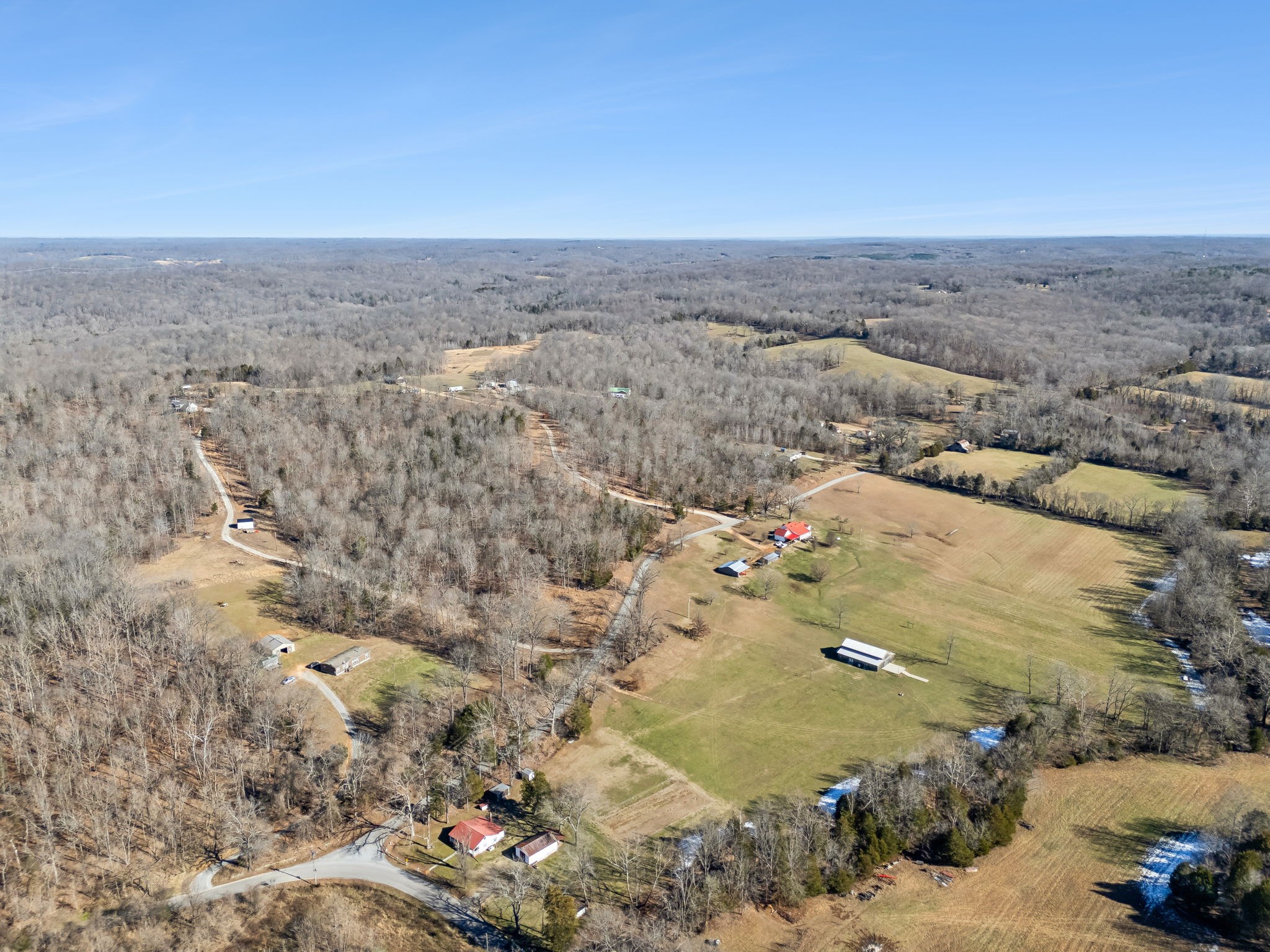 93 Halliburton Road Vanleer, TN 37181 - Photo 70 of 75 an aerial view of residential houses with outdoor space