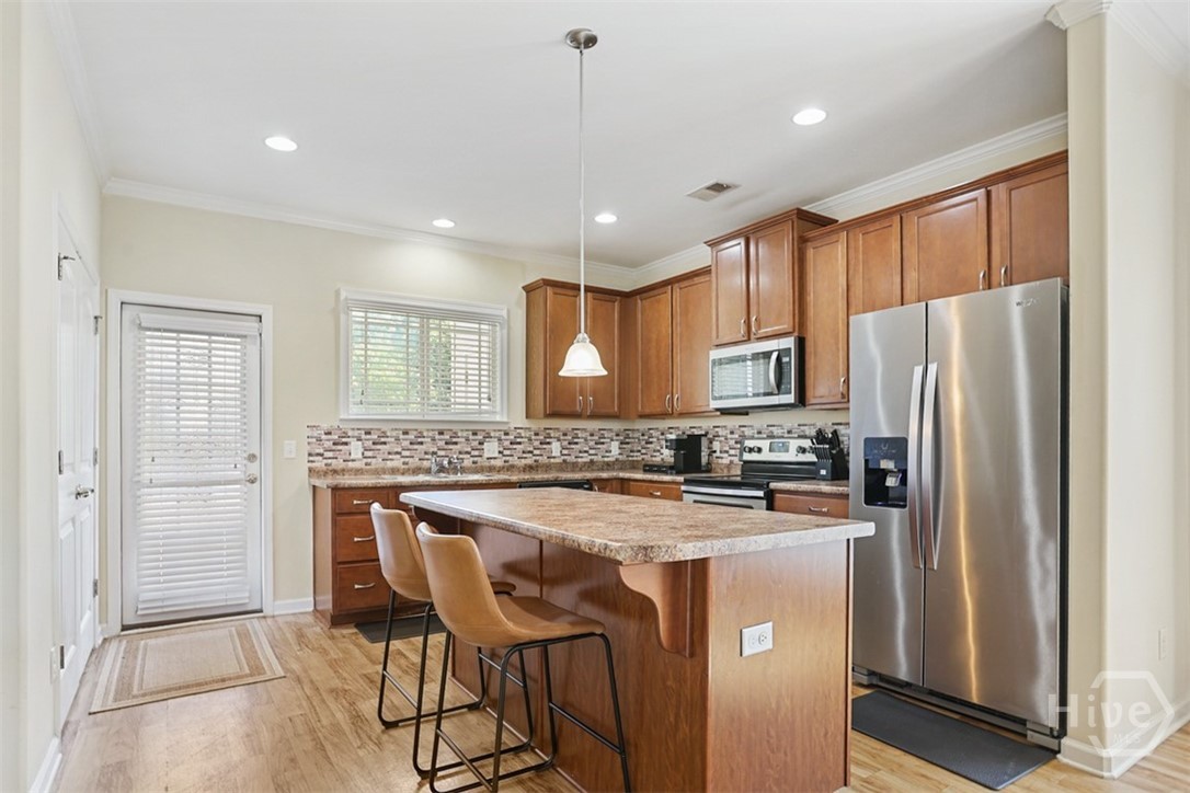 100 Sonata Circle Pooler, GA 31322 - Photo 9 of 31 Kitchen with Island