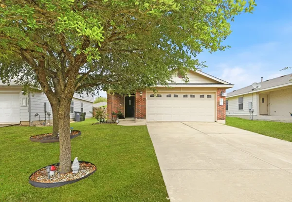 $299,990 | 165 Opal Lake Drive, Kyle, TX 78640