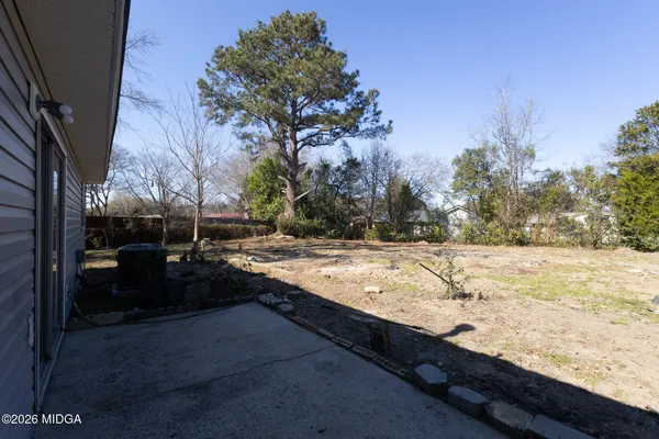 a view of yard and covered with snow