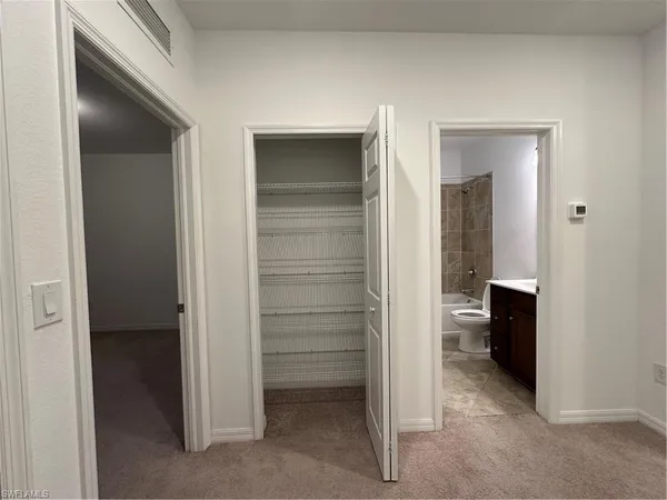 a bathroom with a sink double vanity and a shower