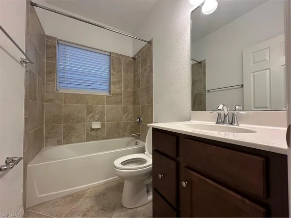 $430,000 | 10100 Tin Maple Drive, Unit 15, Estero, FL 33928