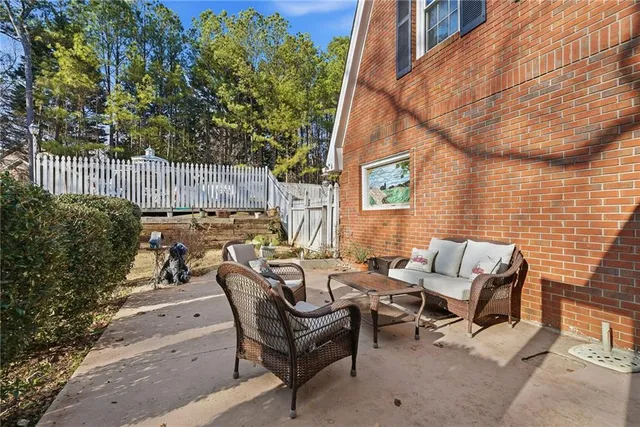 a spacious bathroom with a double vanity sink and a mirror