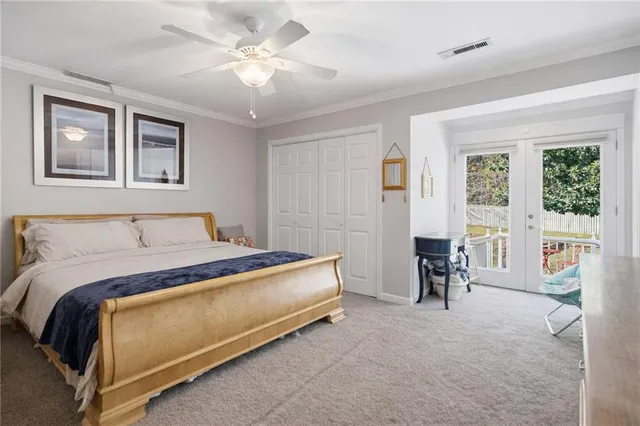 a bathroom with a shower a toilet and a sink