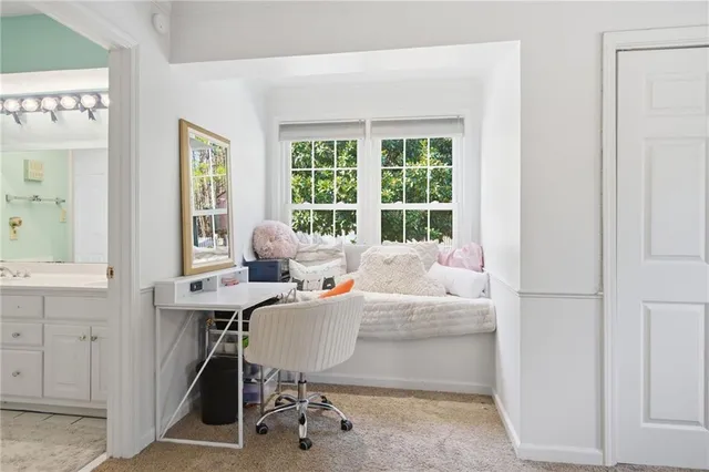 a white toilet sitting next to a bath tub shower