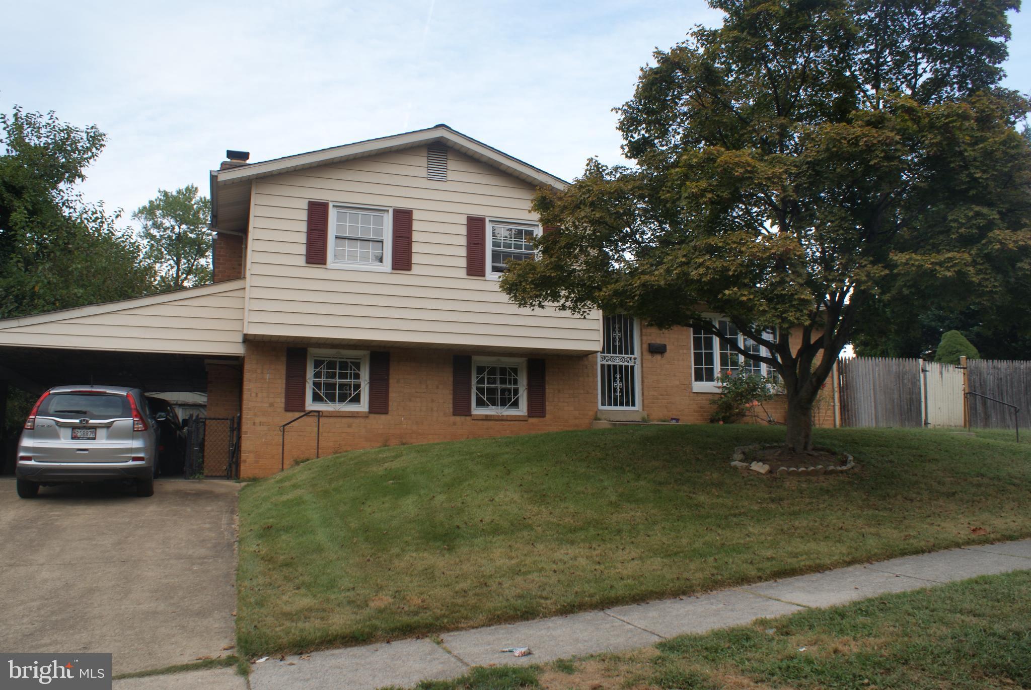 9601 East Light Drive Silver Spring, MD 20903 - Photo 1 of 25 a view of a car parked in front of a house